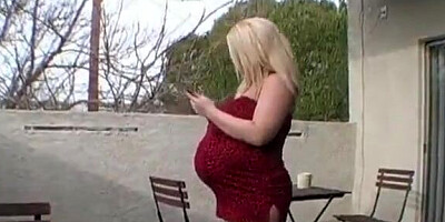 Pregnant blonde is in a lustful trance and needs to get fucked